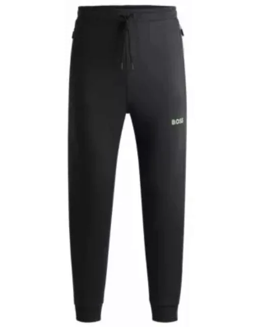 Tracksuit bottoms with 3D-molded logo- Dark Grey Men's Jogging Pant
