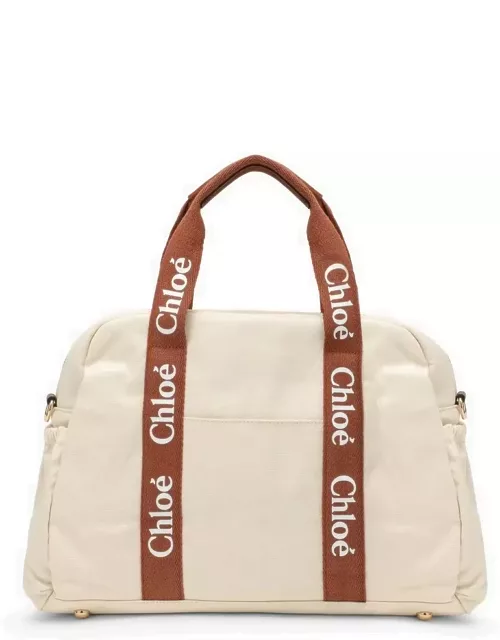 Ivory changing bag with logo