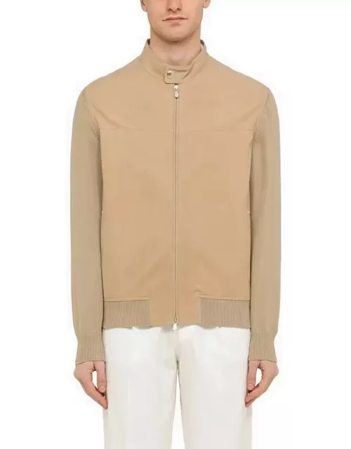 Beige leather jacket with knitted sleeve