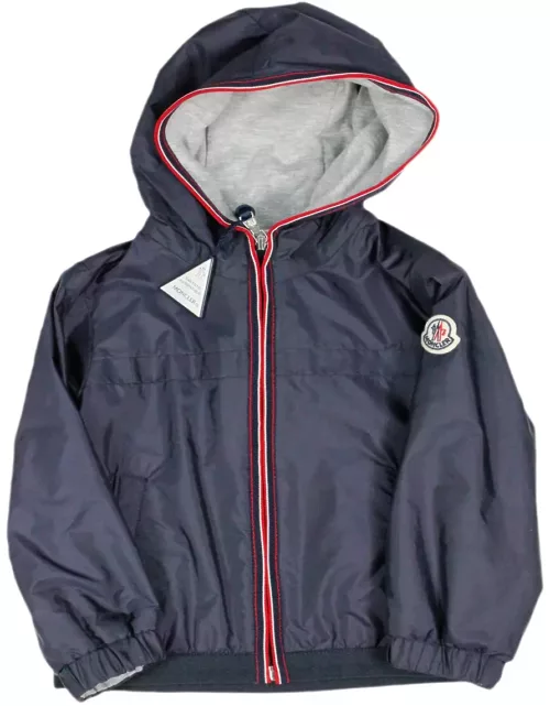 Moncler Windproof Jacket In Technical Fabric With Hood And Cotton Lining. Colored Profile On The Zip And Hood