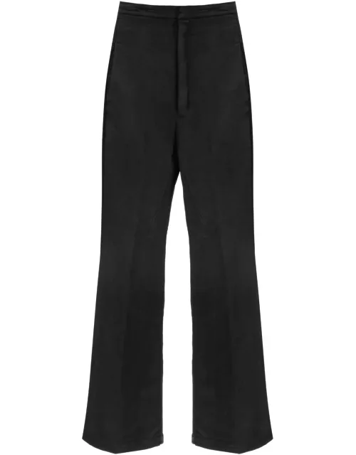 RICK OWENS high-waisted bootcut jeans with a