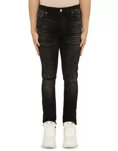 Faded black distressed skinny jean