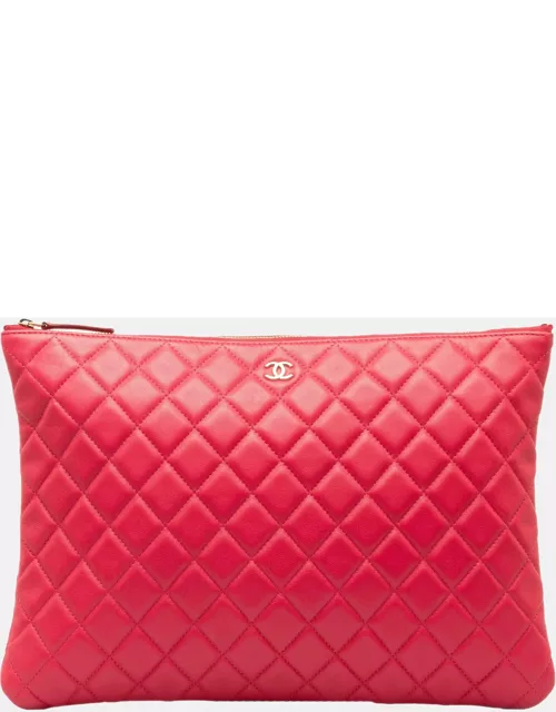 Chanel Pink Quilted O Case Clutch