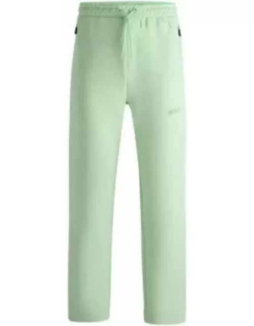 Open-hem tracksuit bottoms with 3D-molded logo- Light Green Men's Jogging Pant
