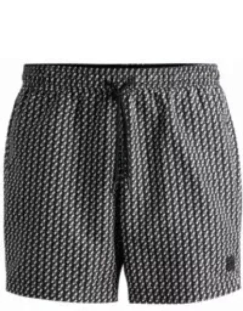 Logo-label swim shorts with seasonal pattern- Black Men's Swim Short