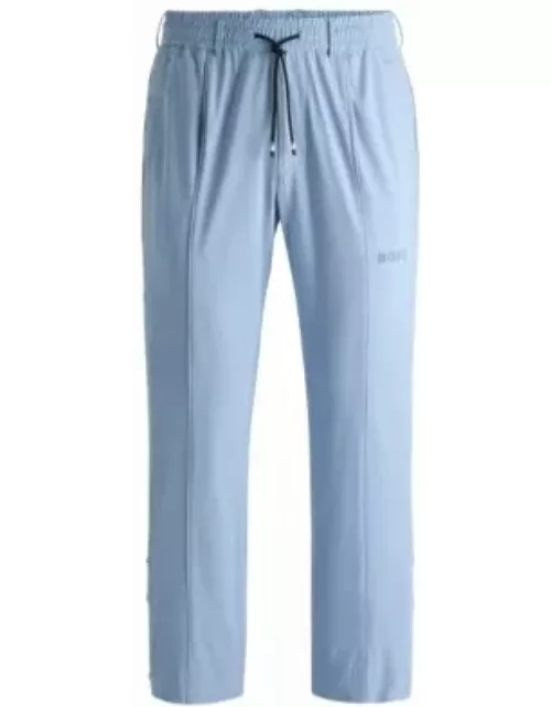 Relaxed-fit trousers with double-monogram badge- Light Blue Men's Casual Pant