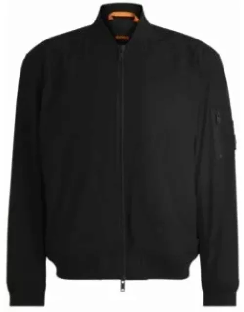 Water-repellent jacket with zipped sleeve pocket- Black Men's Casual Jacket