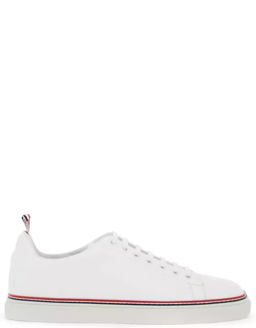 THOM BROWNE smooth leather sneakers with tricolor detail.