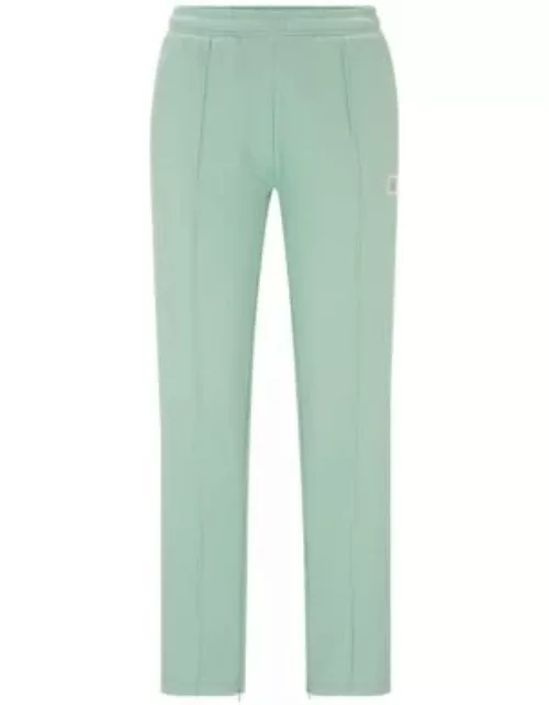 Straight-fit tracksuit bottoms with stacked logo- Light Green Women's Clothing