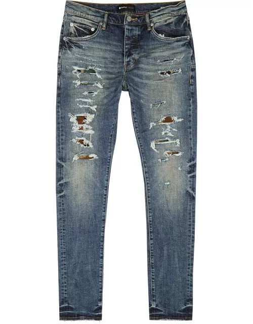 Camo Repair distressed slim-leg jeans