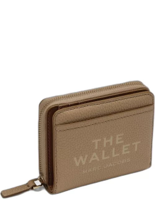 Small compact wallet in camel-coloured leather