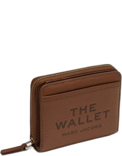Small compact wallet in brown leather