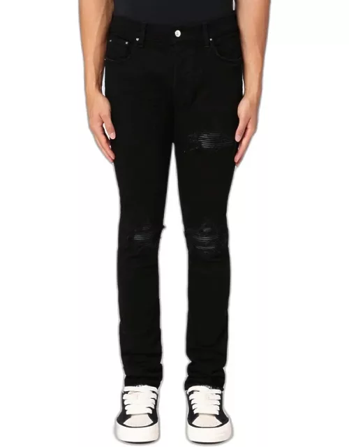 Black skinny jeans with rip