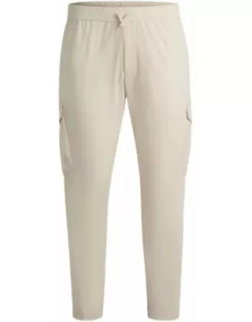 Tapered-fit trousers in easy-iron stretch poplin- White Men's Casual Pant