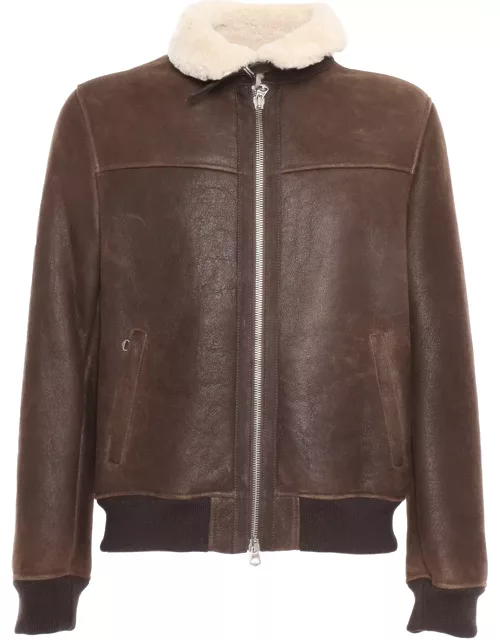 Stewart Shearling Jacket With Shirt Collar Closed With A Strap And Buckle, Double Slider Front Zip Closure, 2 Side Pockets With Zip, Rib Knit Bottom And Cuff