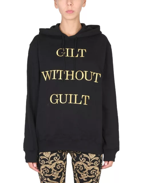 moschino "gilt without guilt" sweatshirt