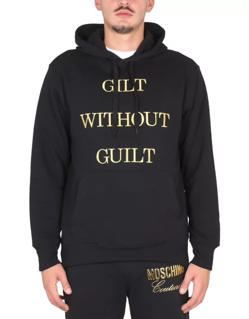 moschino "guilt without guilt" sweatshirt