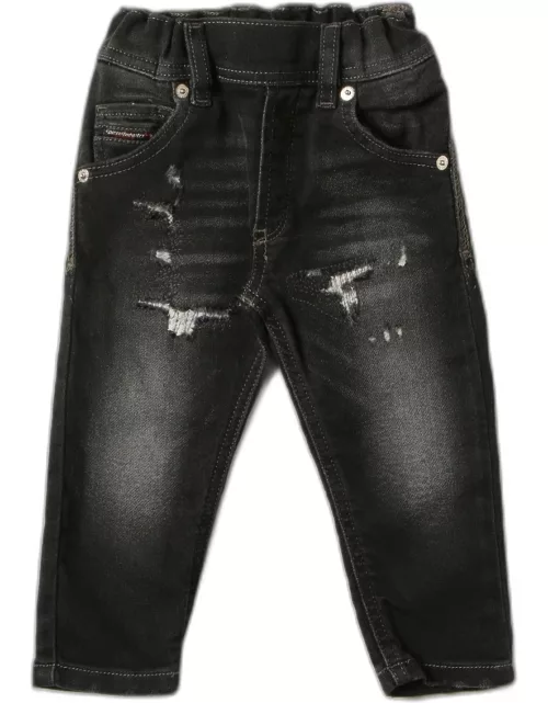 Diesel ripped jeans in washed deni