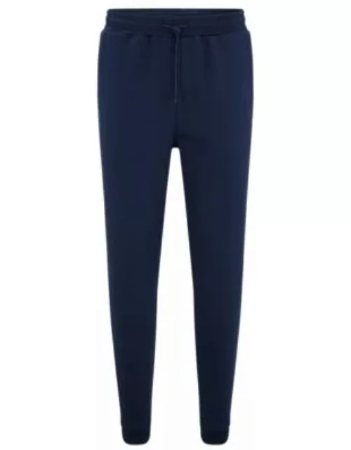 Cotton tracksuit bottoms with curved logo- Dark Blue Men's Jogging Pant
