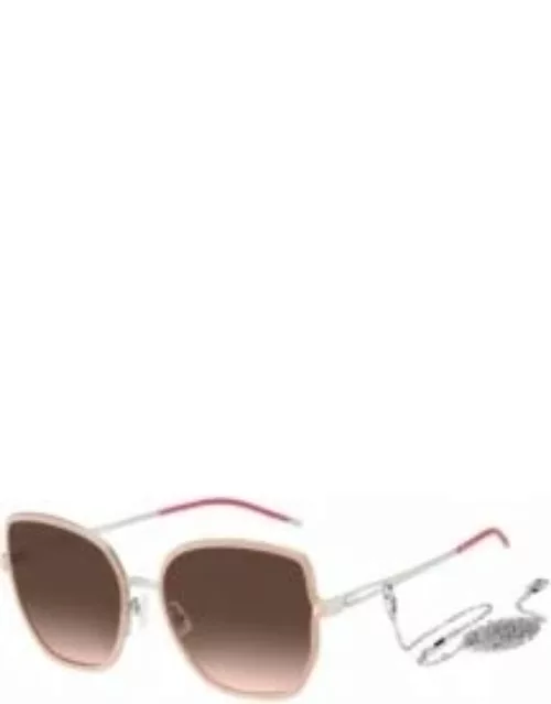 Nude-frame sunglasses with forked temples and branded chain Women's Eyewear