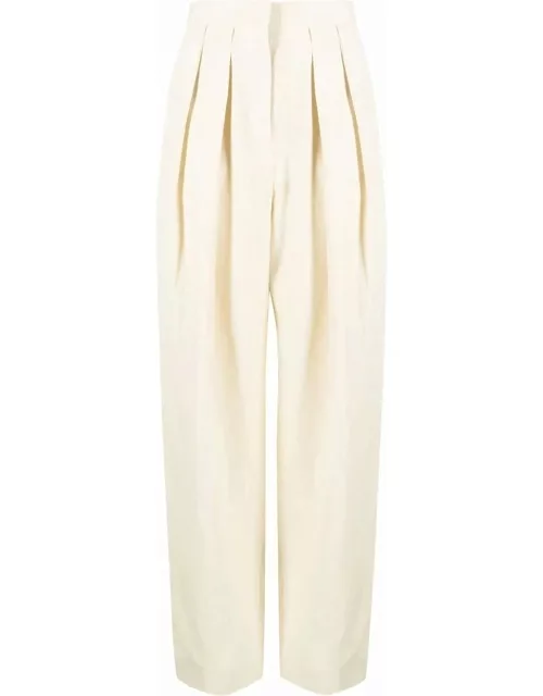 High-waisted tailored pants with beige pleat