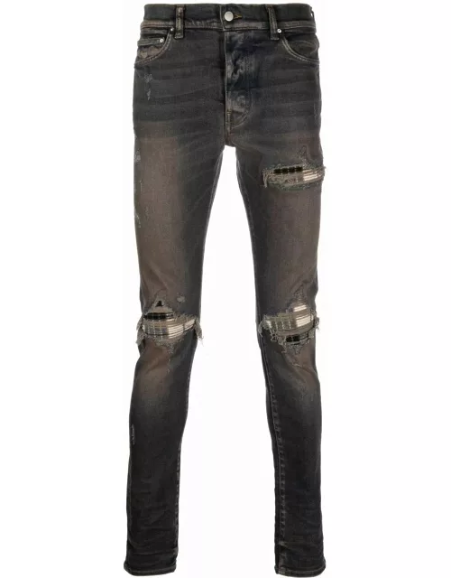 Indigo blue slim jeans with distressed effect