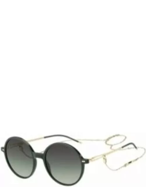 Round-frame sunglasses in green acetate with branded chain Women's Eyewear