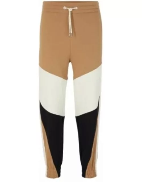 Cotton-terry tracksuit bottoms with color-blocking and logo- Beige Women'