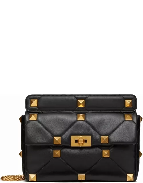 Large black bag with gold Roman stud chain