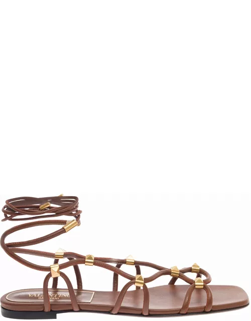 Valentino Garavani Brown Flat Sandals With Signature Studs And Ankle Strap In Leather Woman