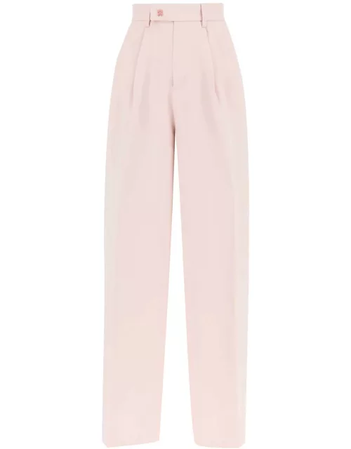 AMIRI PANTS WITH WIDE LEG AND PLEAT