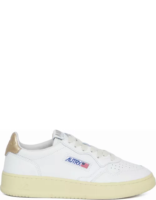 Medalist white and gold sneaker
