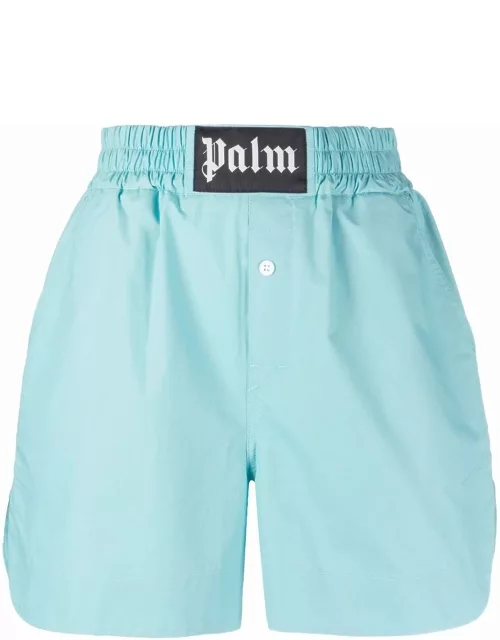 Light blue sports shorts with waistband appliqué