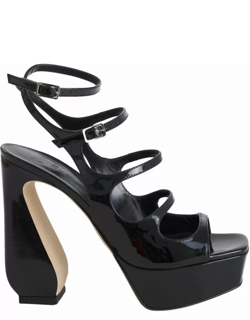 Black patent leather sandals with sculpted hee