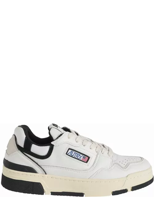 White Action trainers with black insert