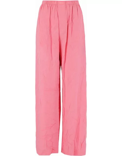 Pink wide-leg silk trousers with logo