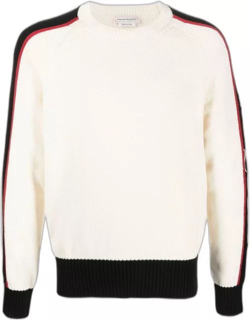 Cream-colored sweater with striped detailing