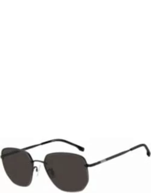 Half-rim sunglasses in black titanium and metal Men's Eyewear