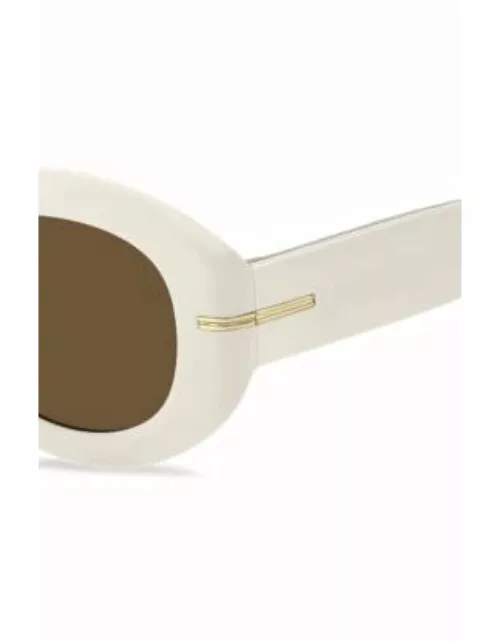 White-acetate sunglasses with signature gold-tone detail Women's Eyewear