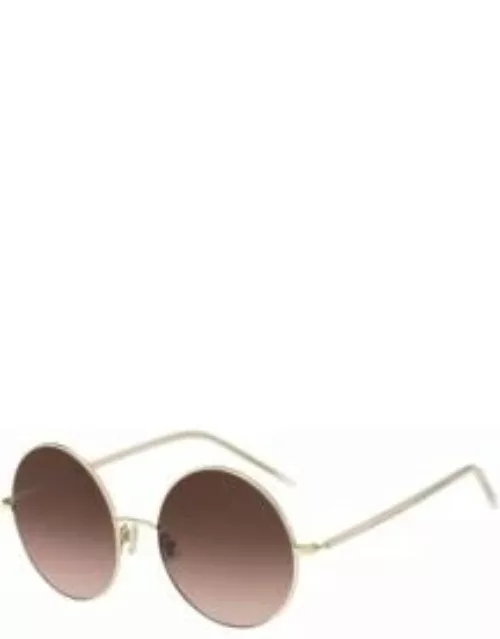 Round sunglasses in gold-tone titanium Women's Eyewear