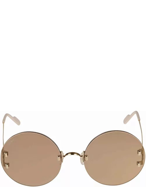 Cartier Eyewear Round Rimless Sunglasse