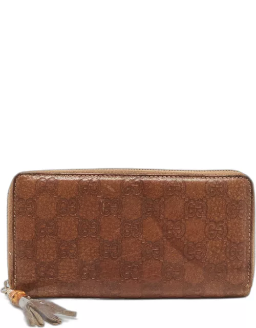 Gucci Brown Guccissima Leather Bamboo Tassel Zip Around Wallet