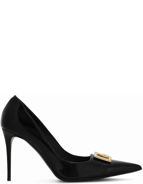 Black pumps with gold logo