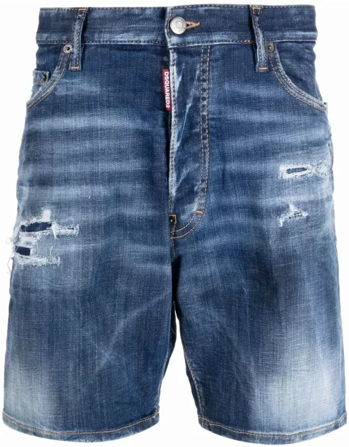Stonewashed blue shorts with ripped detai