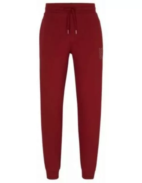 Cotton-terry tracksuit bottoms with metallic-effect logo- Dark Red Men's Loungewear