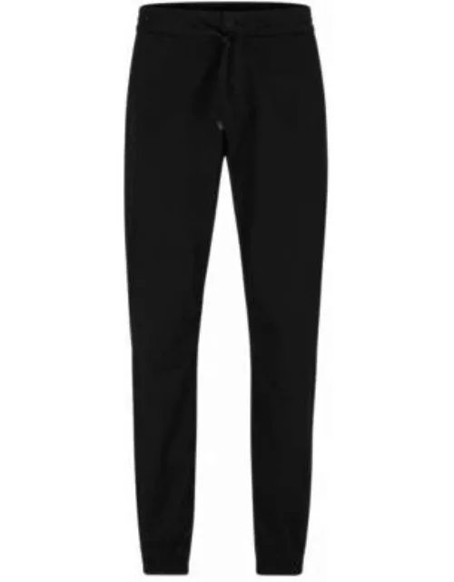 Cuffed slim-fit trousers in stretch-cotton gabardine- Black Men's Casual Pant