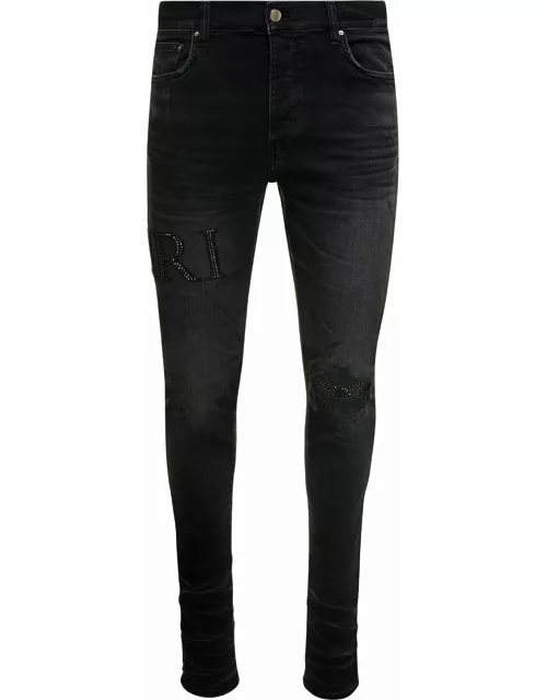 AMIRI Black Skinny Jeans With Crystal Embellished Logo And Used Effect In Stretch Cotton Denim Man