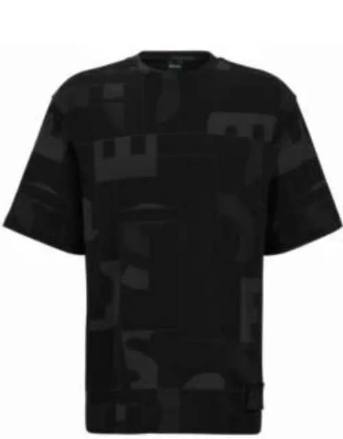 Relaxed-fit T-shirt with all-over logo print- Black Men's T-Shirt