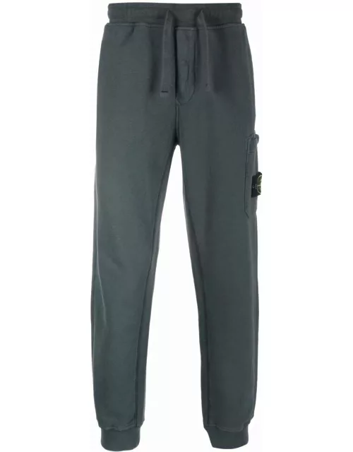 Powder blue sport pants with Compass patch