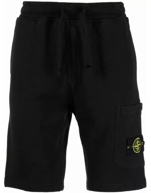 Black sports shorts with Compass logo applique